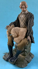 Antiker Mann sitzend 26cm